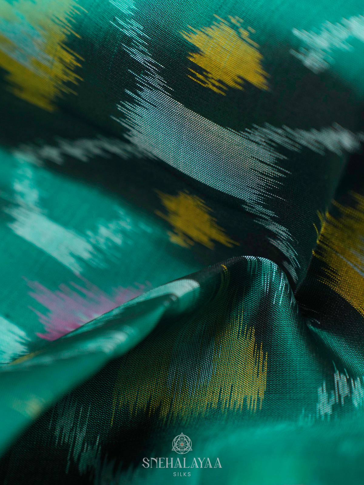Teal Green Ikat Soft Silk Saree