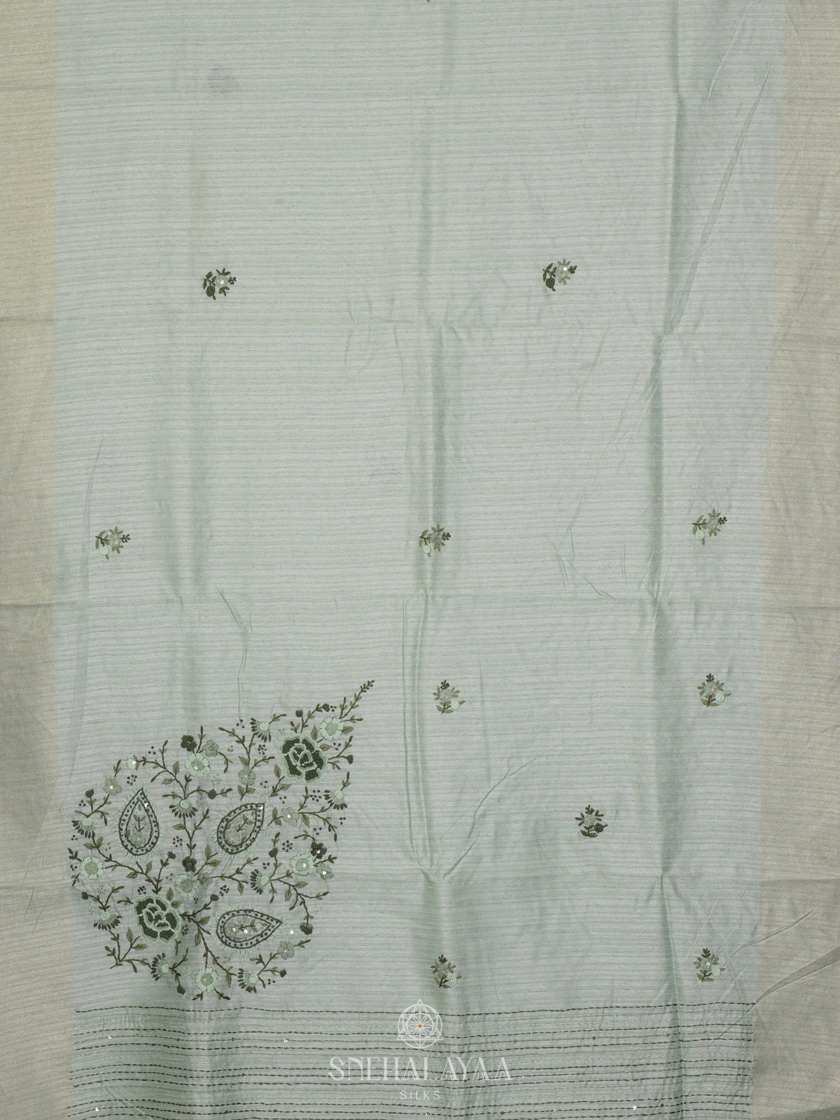 Pale Green Linen Embroidery Saree