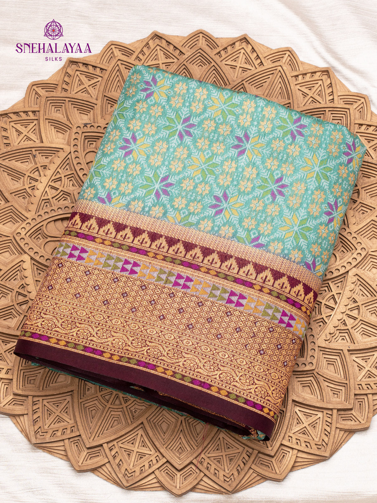 Teal Green Ikat Silk Saree