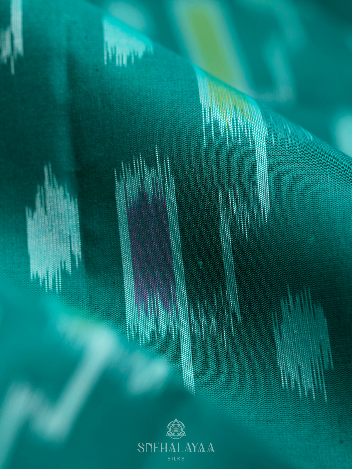 Teal Ikat Soft Silk Saree