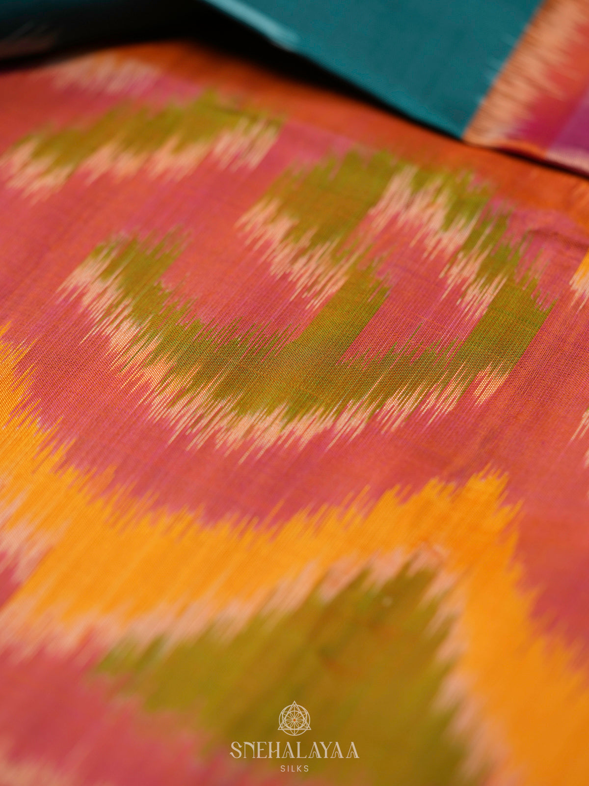 Teal Ikat Soft Silk Saree