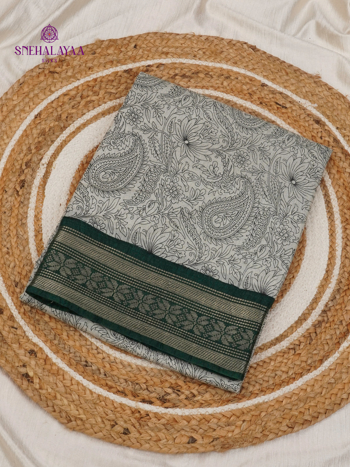 Off-White Kalamkari Saree with Dark Green Woven Border