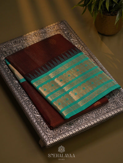 Maroon Kuppadam Silk Cotton Saree with Sky Blue Border