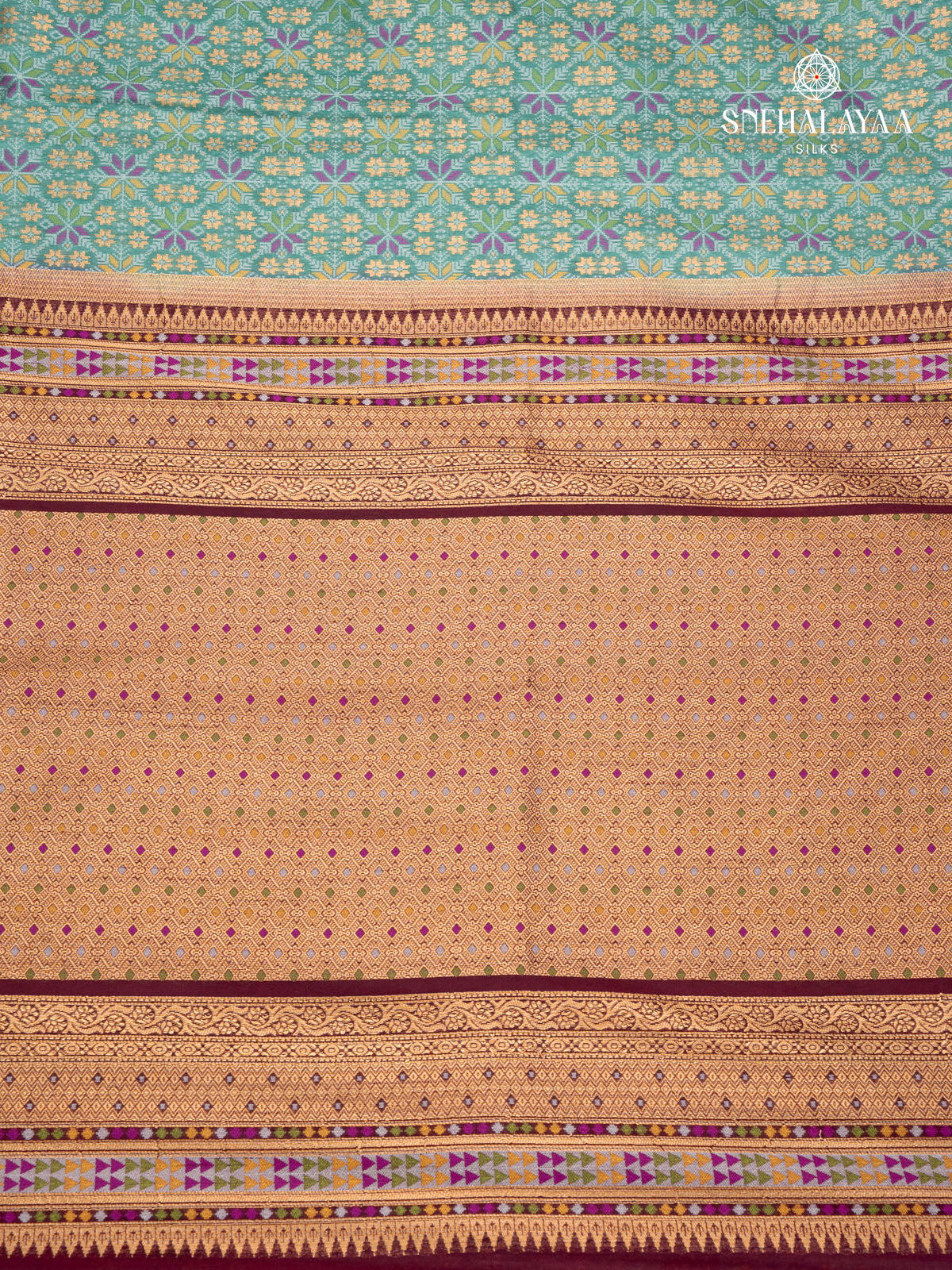 Teal Green Ikat Silk Saree