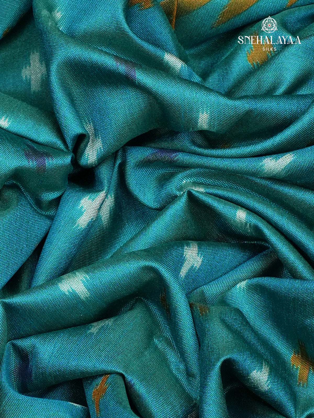 Teal Green Ikat Saree