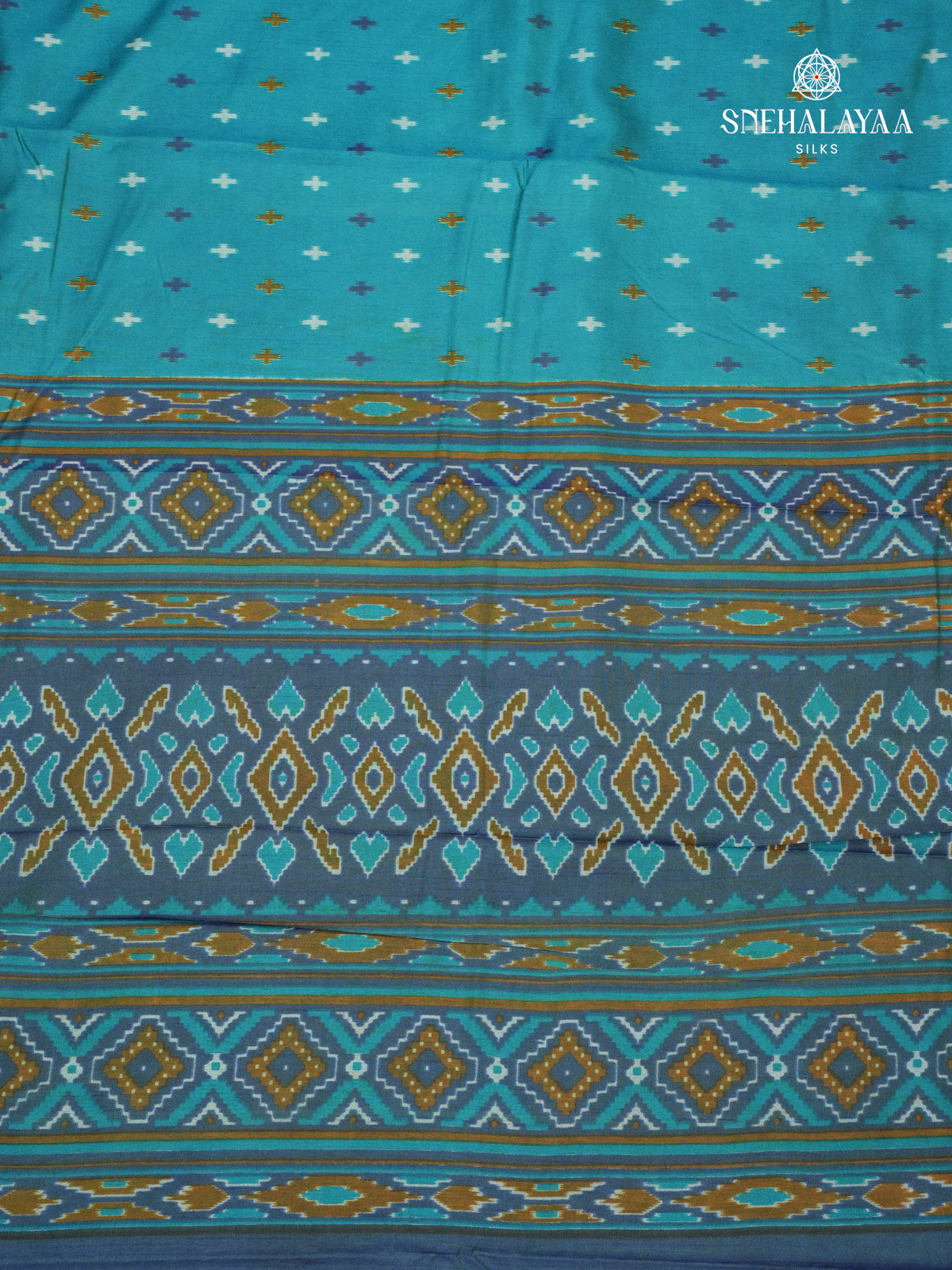 Teal Green Ikat Saree