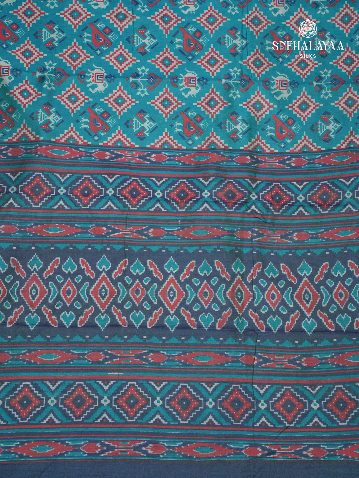 Teal Blue Ikat Saree