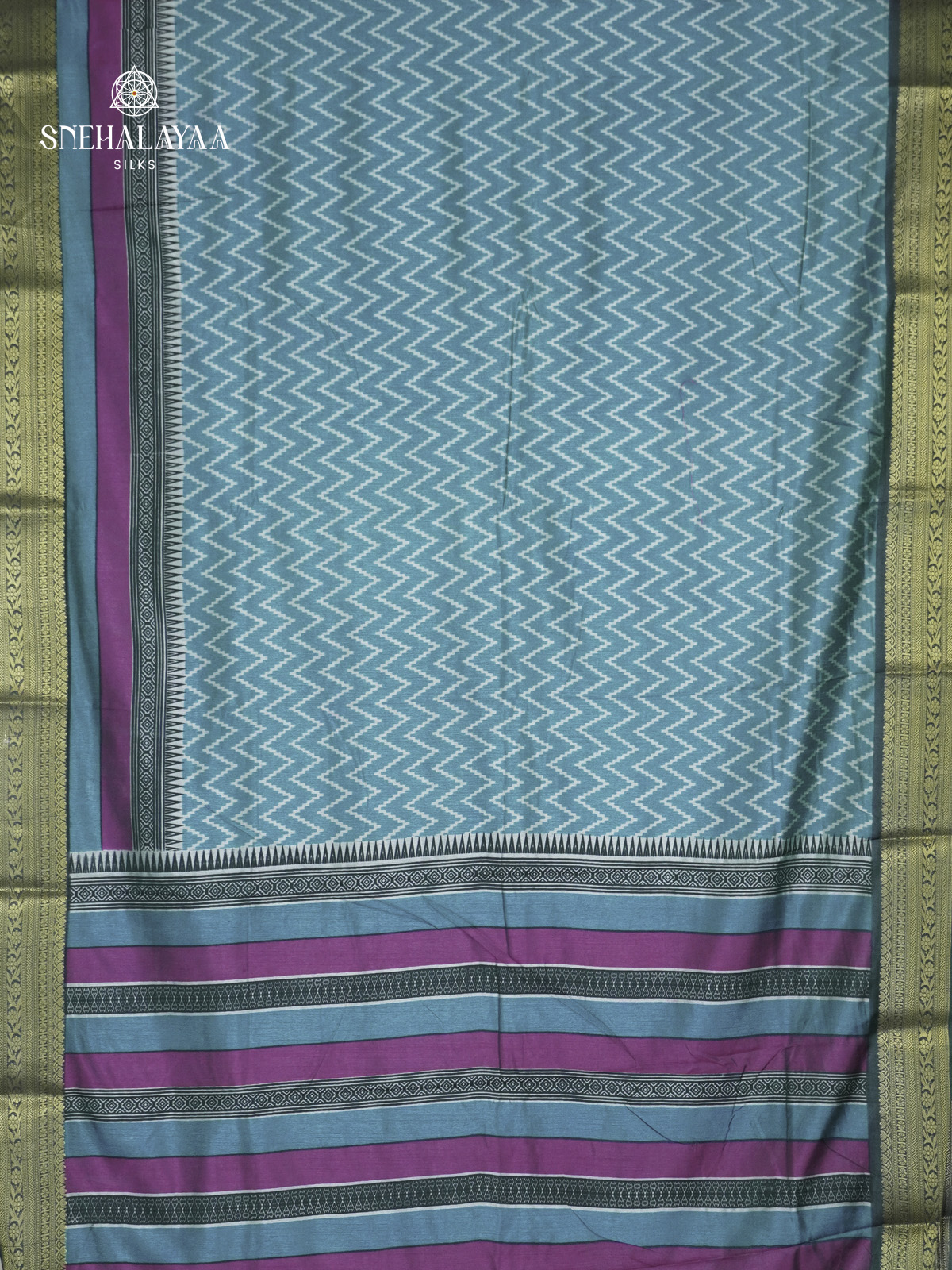 Teal Green Ikat Silk Saree