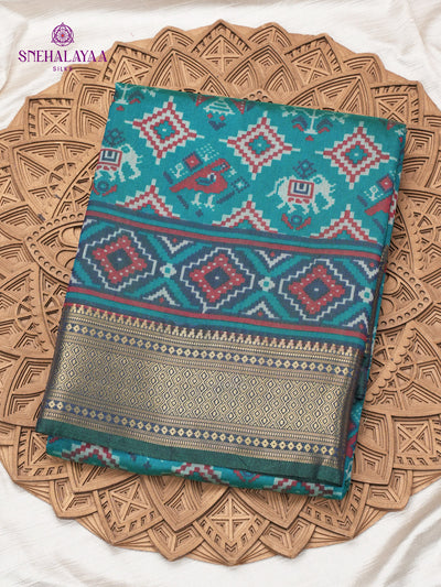 Teal Blue Ikat Saree