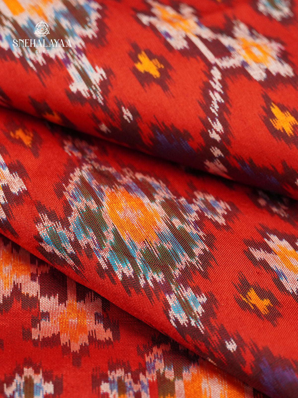 Rust Orange Ikat Saree