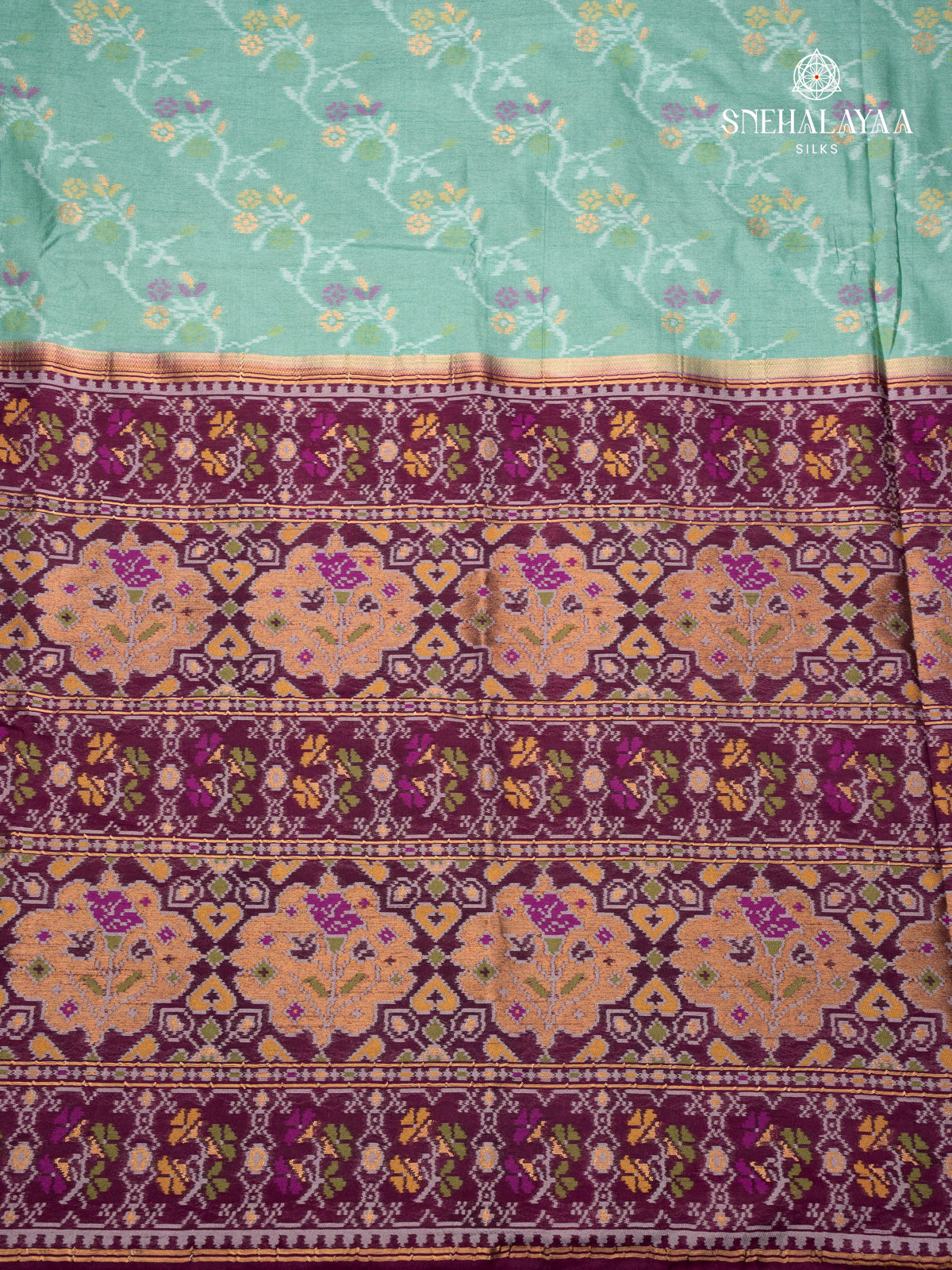 Pale Green Ikat Silk Saree