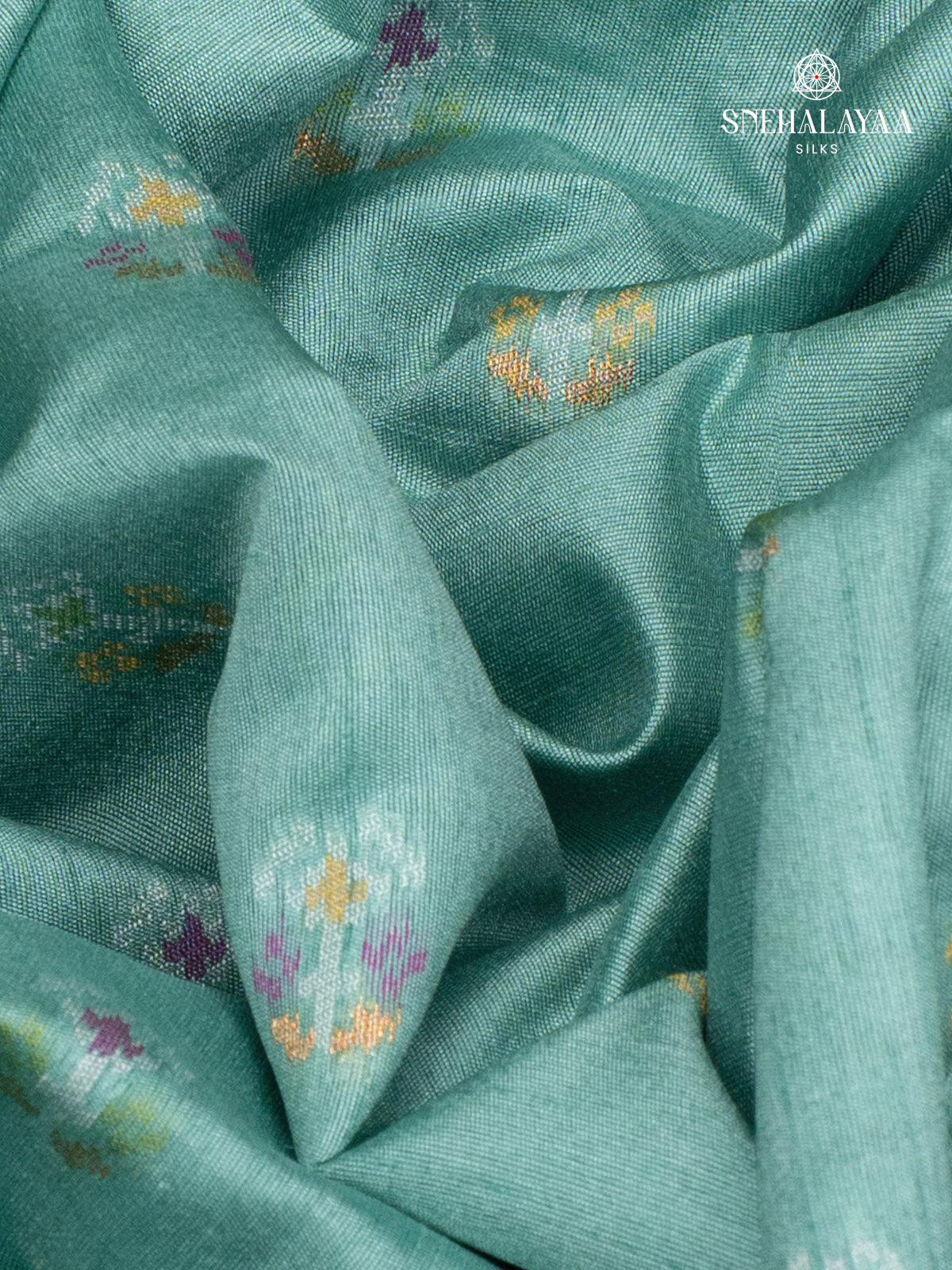 Teal Green Ikat Silk Saree