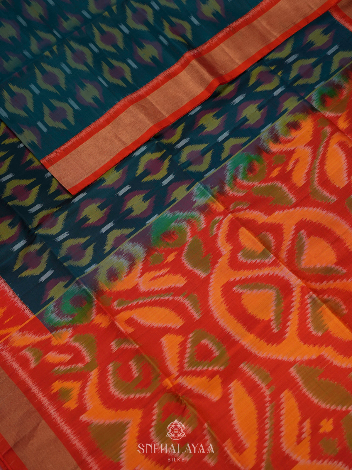 Peacock Blue Ikat Soft Silk Saree