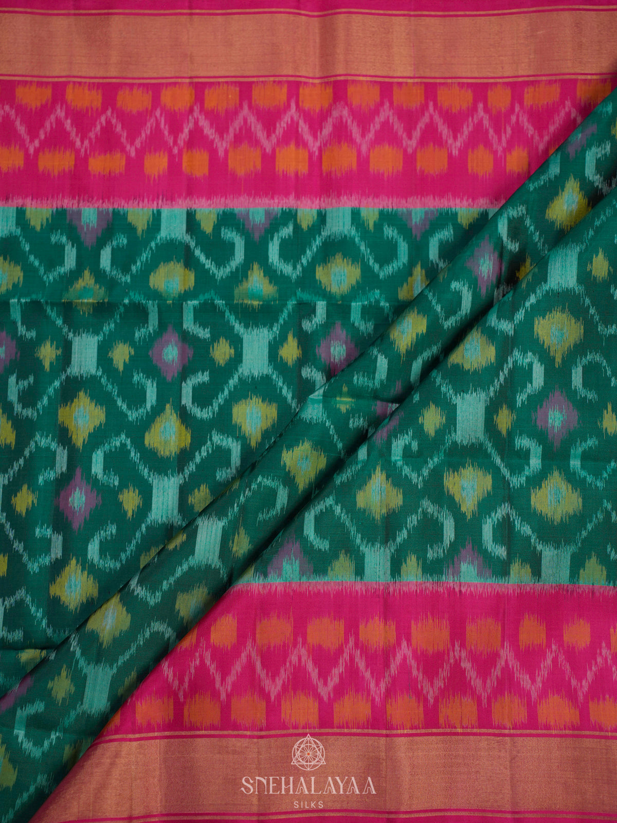 Teal Green Ikat Soft Silk Saree
