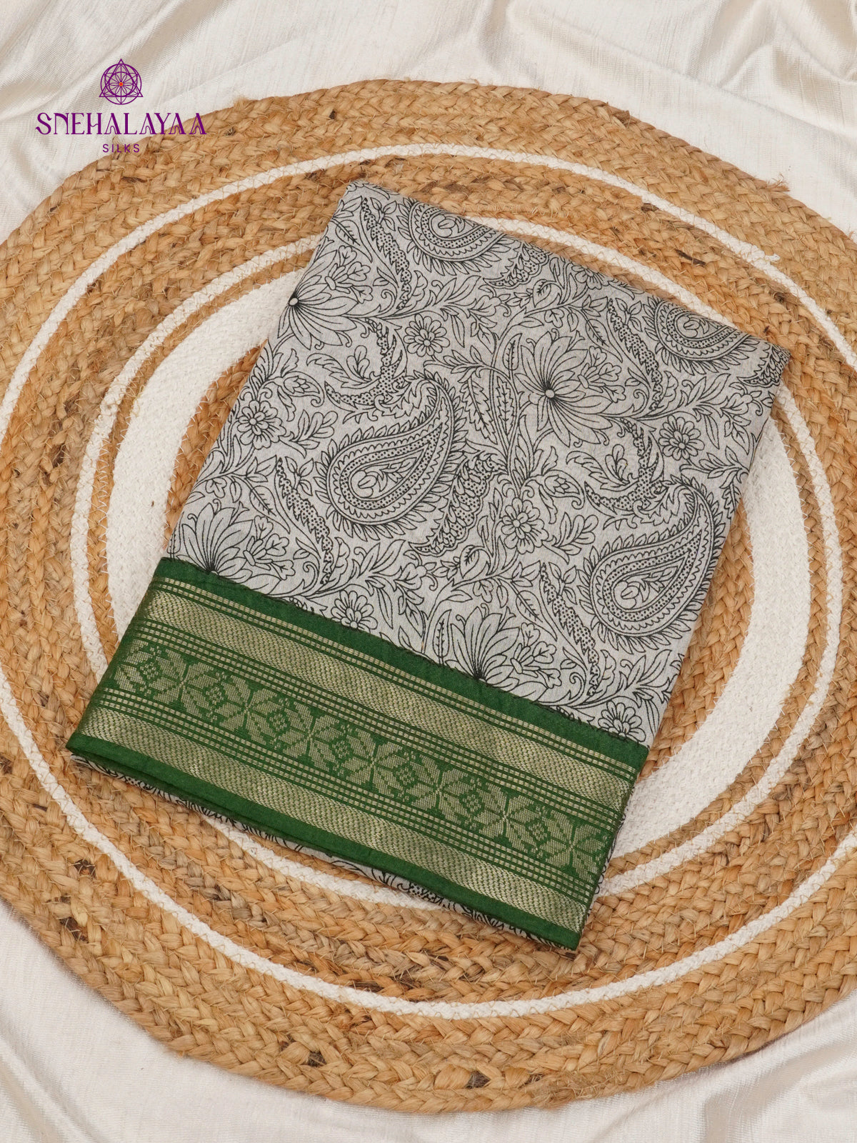 Off-White Kalamkari Saree with Green Woven Border