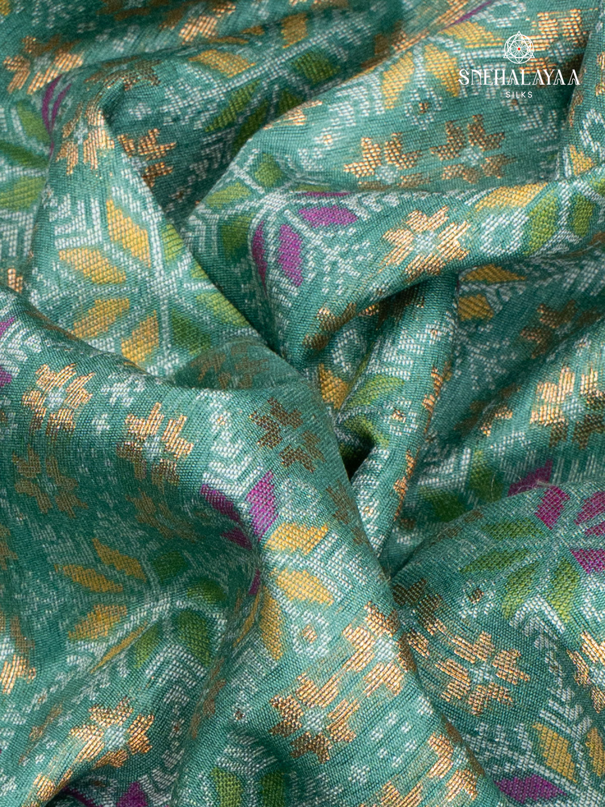 Teal Green Ikat Silk Saree