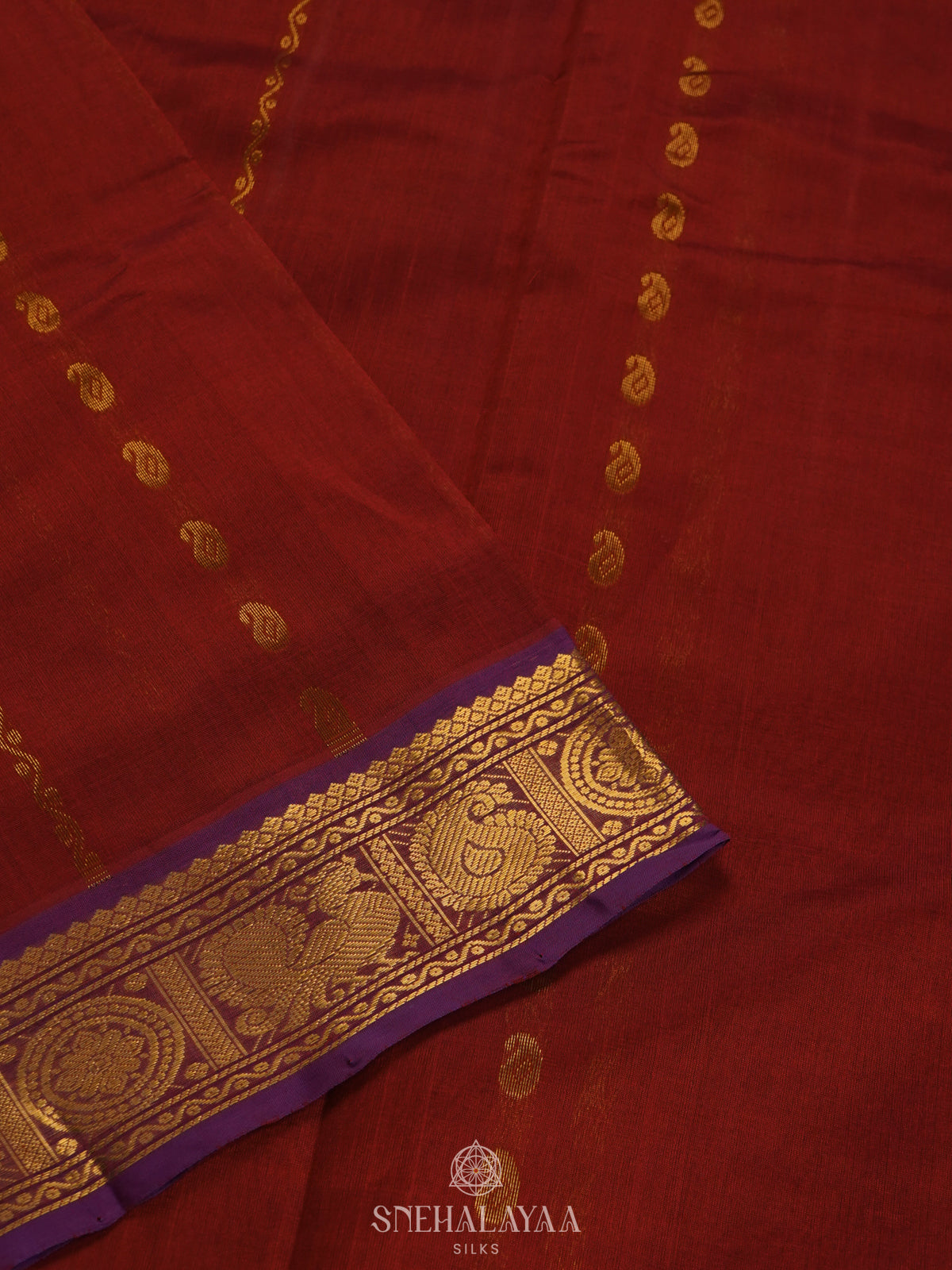 Maroon Silk Cotton Saree with Zari Woven Buttas and Rich Golden Zari Border