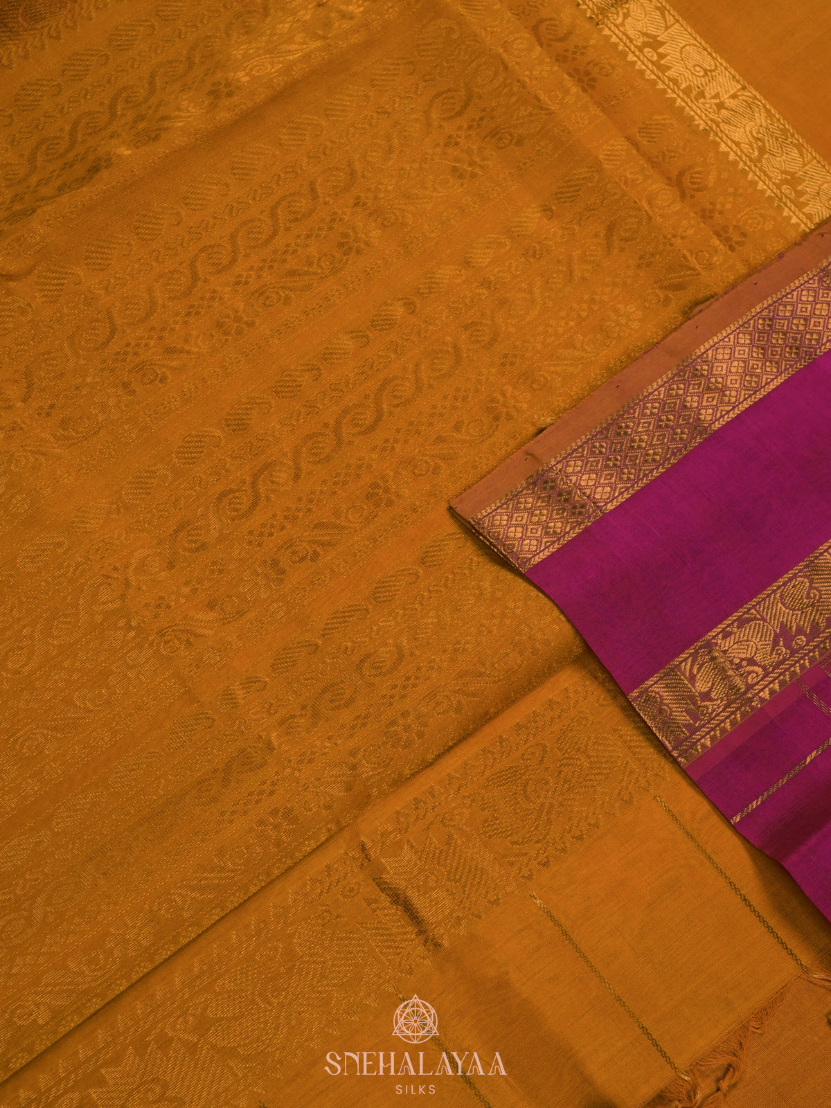 Pink Checked Silk Cotton Saree with Traditional Motifs and Zari Woven Border