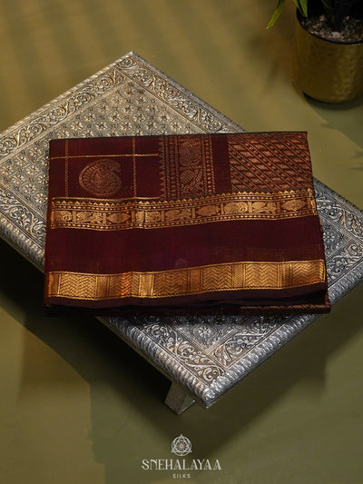 Maroon Checked Silk Cotton Saree with Traditional Motifs and Zari Woven Border