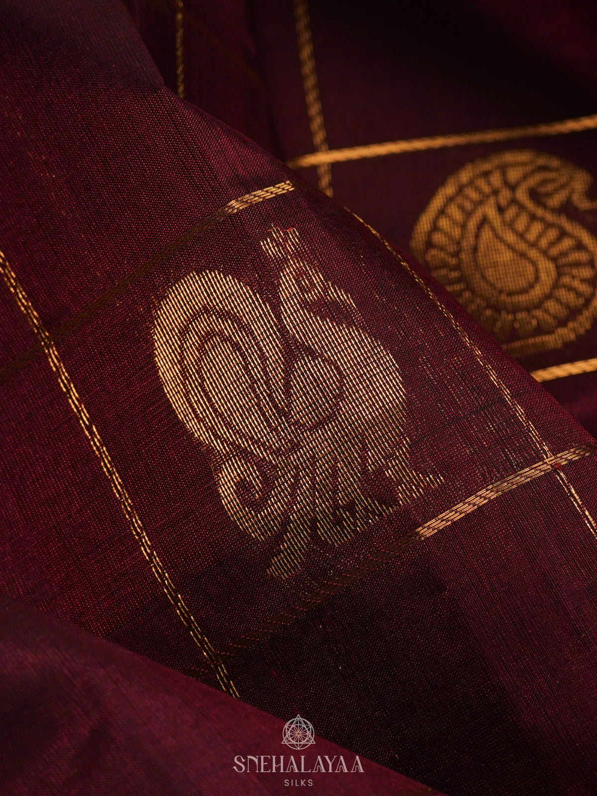Maroon Checked Silk Cotton Saree with Traditional Motifs and Zari Woven Border