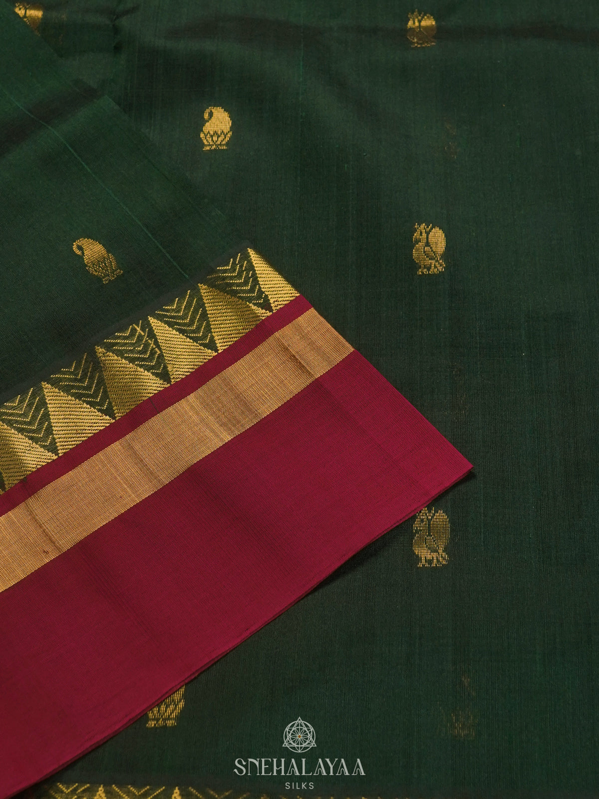 Forest Green Silk Cotton Saree with Zari Woven Buttas and Temple Border