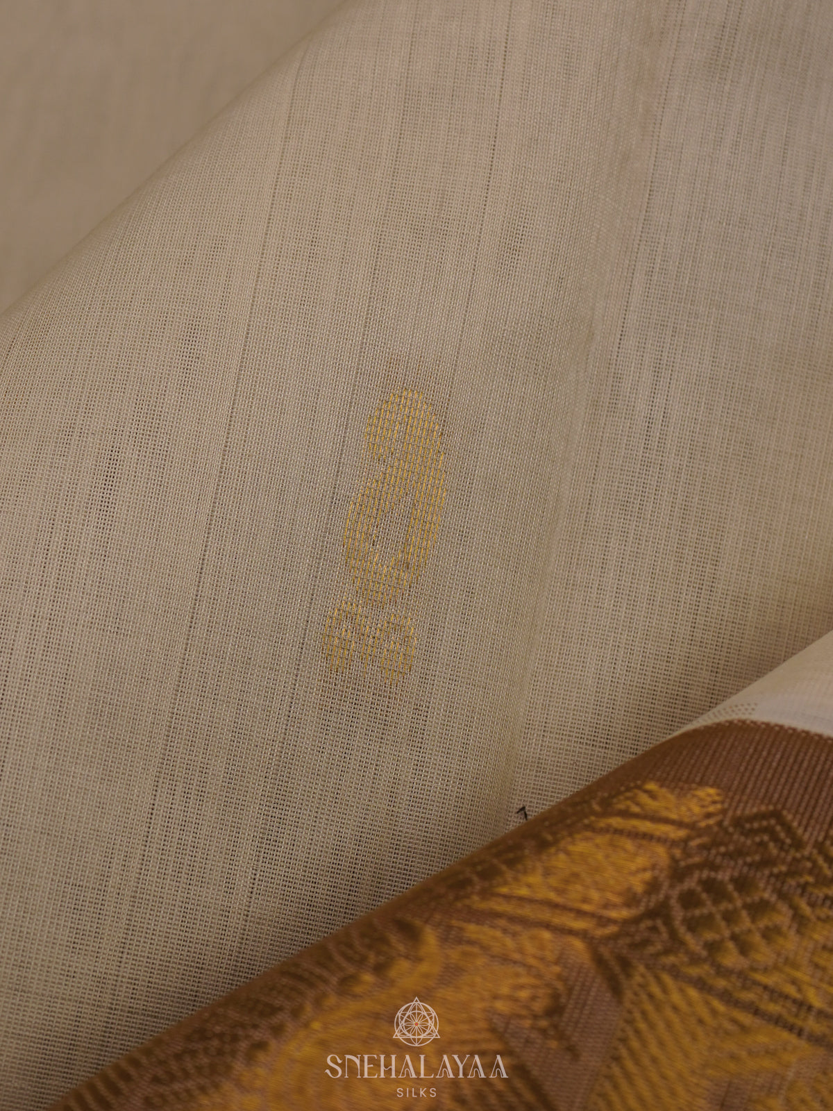 Off White Silk Cotton Saree with Zari Woven Buttas and Rich Golden Zari Border