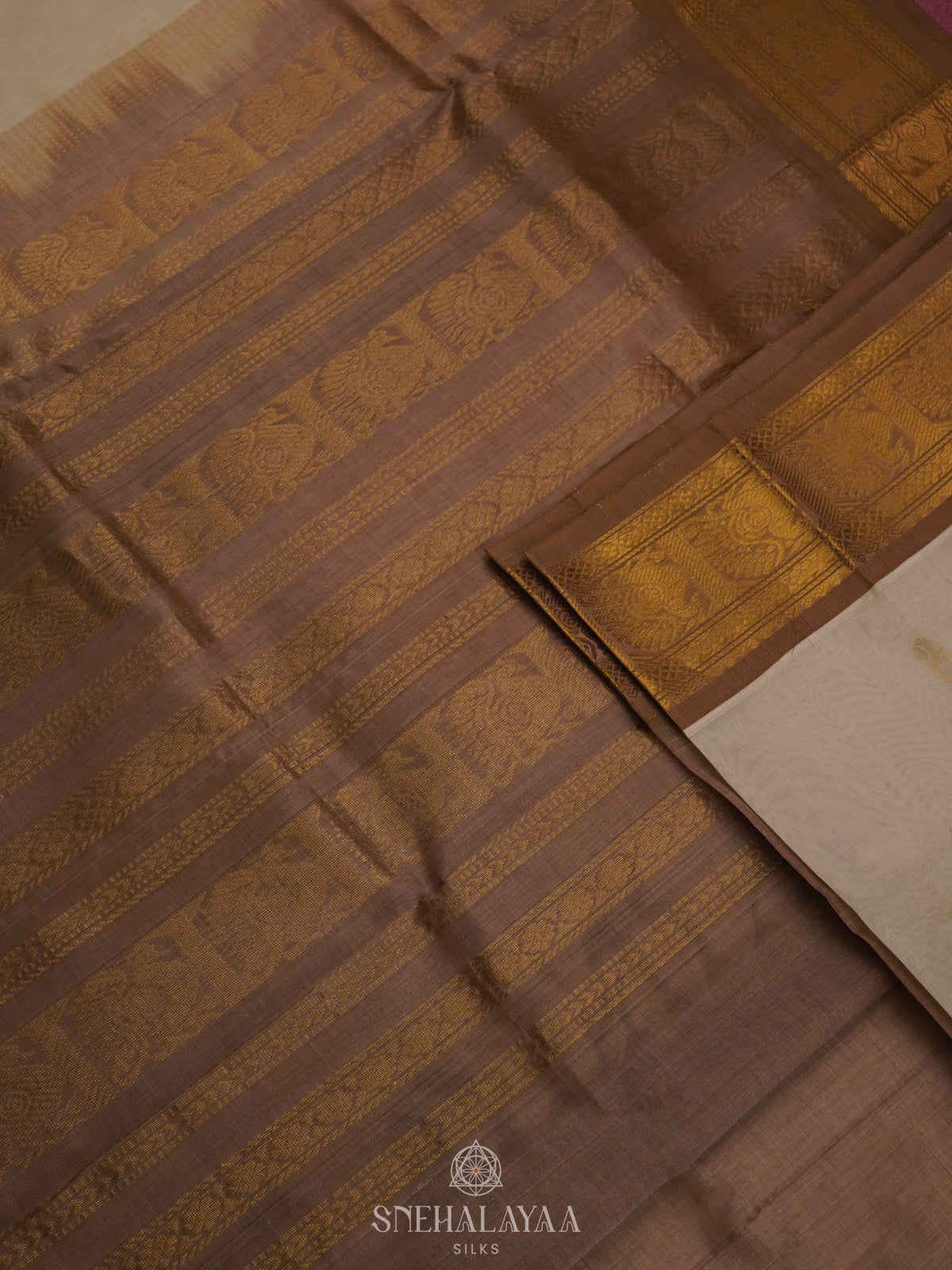 Off White Silk Cotton Saree with Zari Woven Buttas and Rich Golden Zari Border