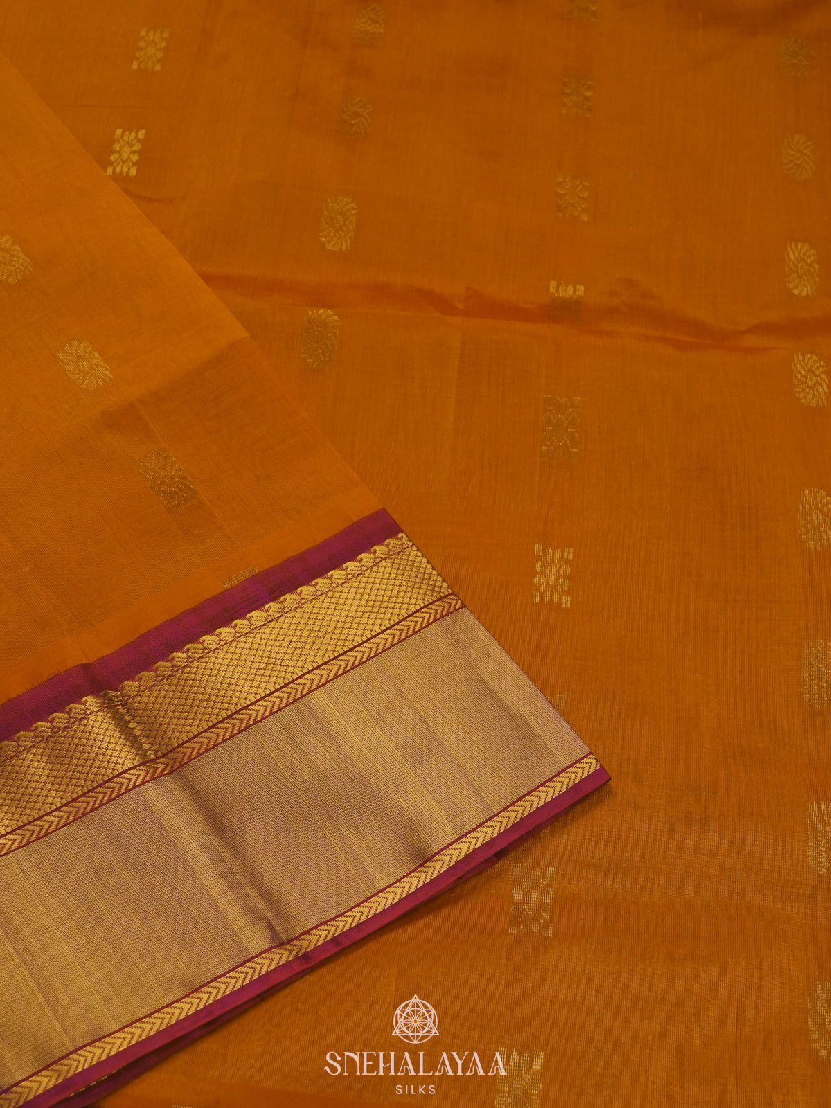 Orange Silk Cotton Saree with Zari Woven Buttas and Rich Golden Zari Border