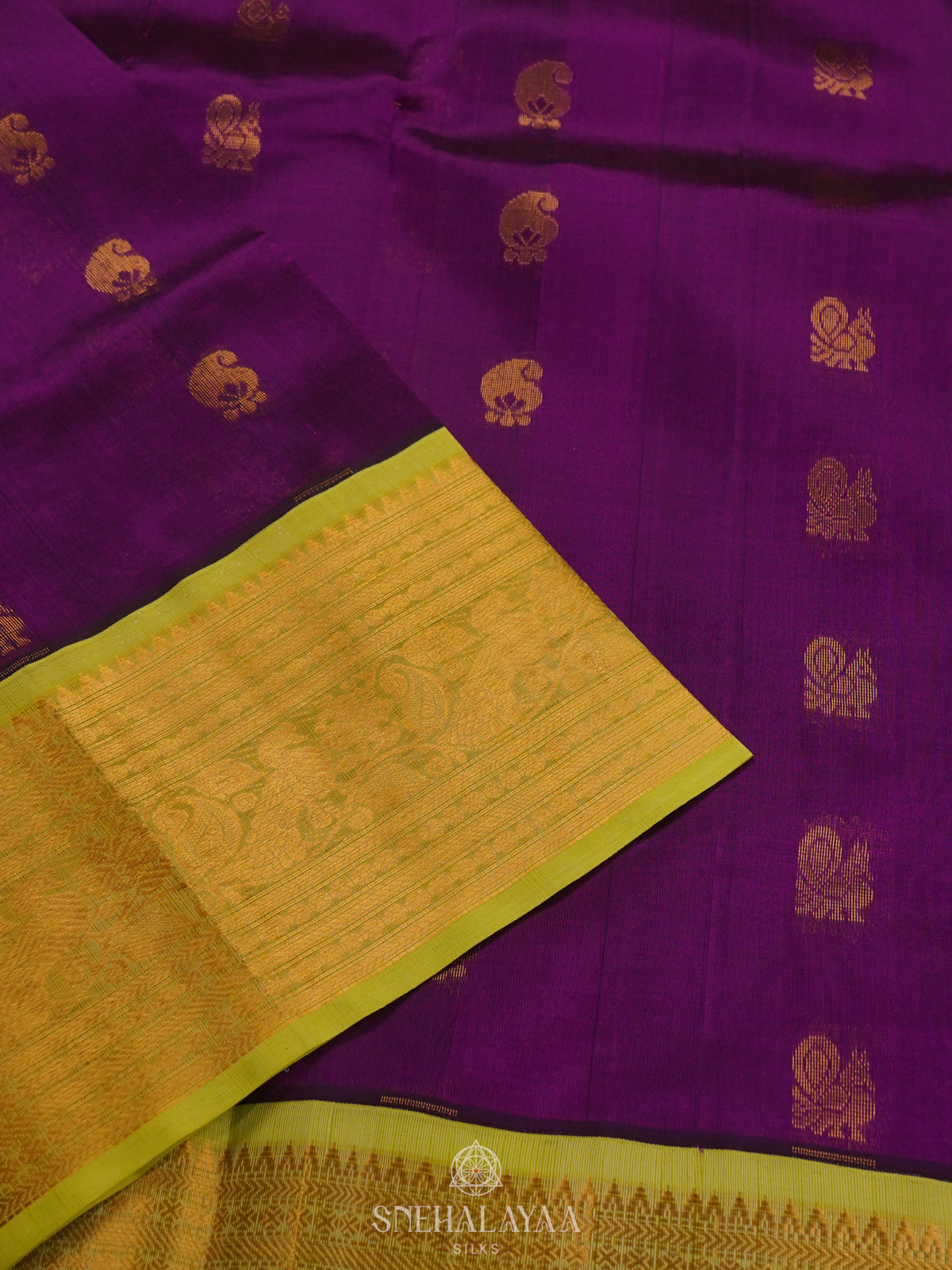 Purple Silk Cotton Saree with Zari Woven Buttas and Rich Golden Zari Border