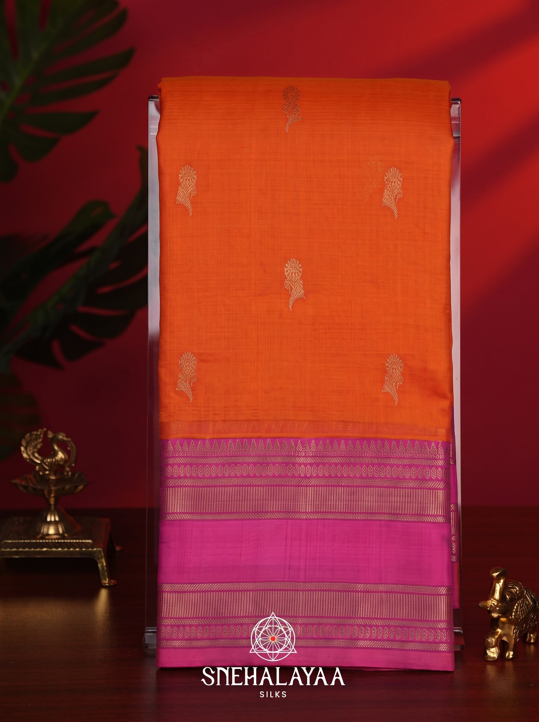 Orange Kanchi Kora Silk Saree with Pink Zari Border