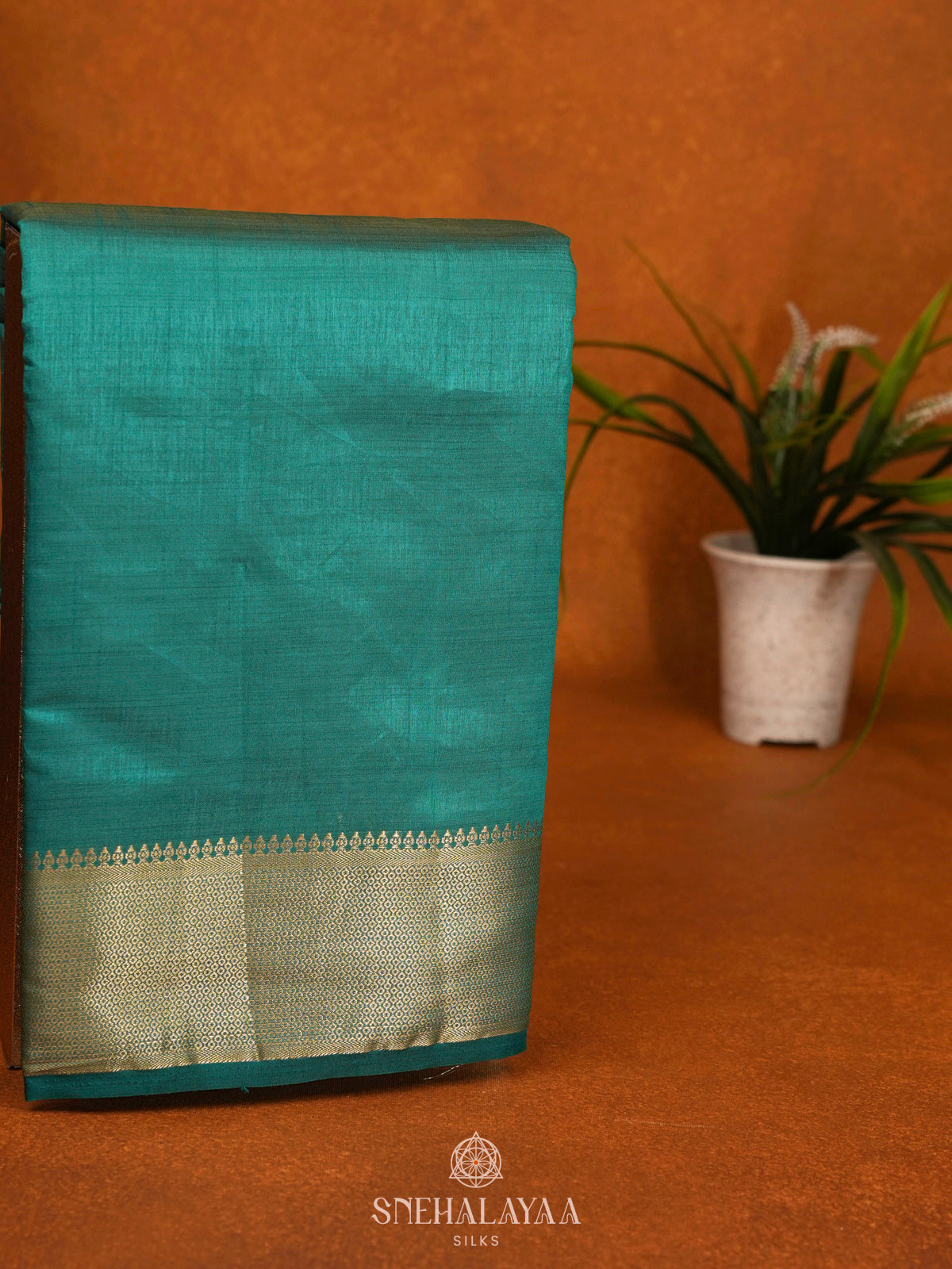 Teal Green Raw Silk Saree