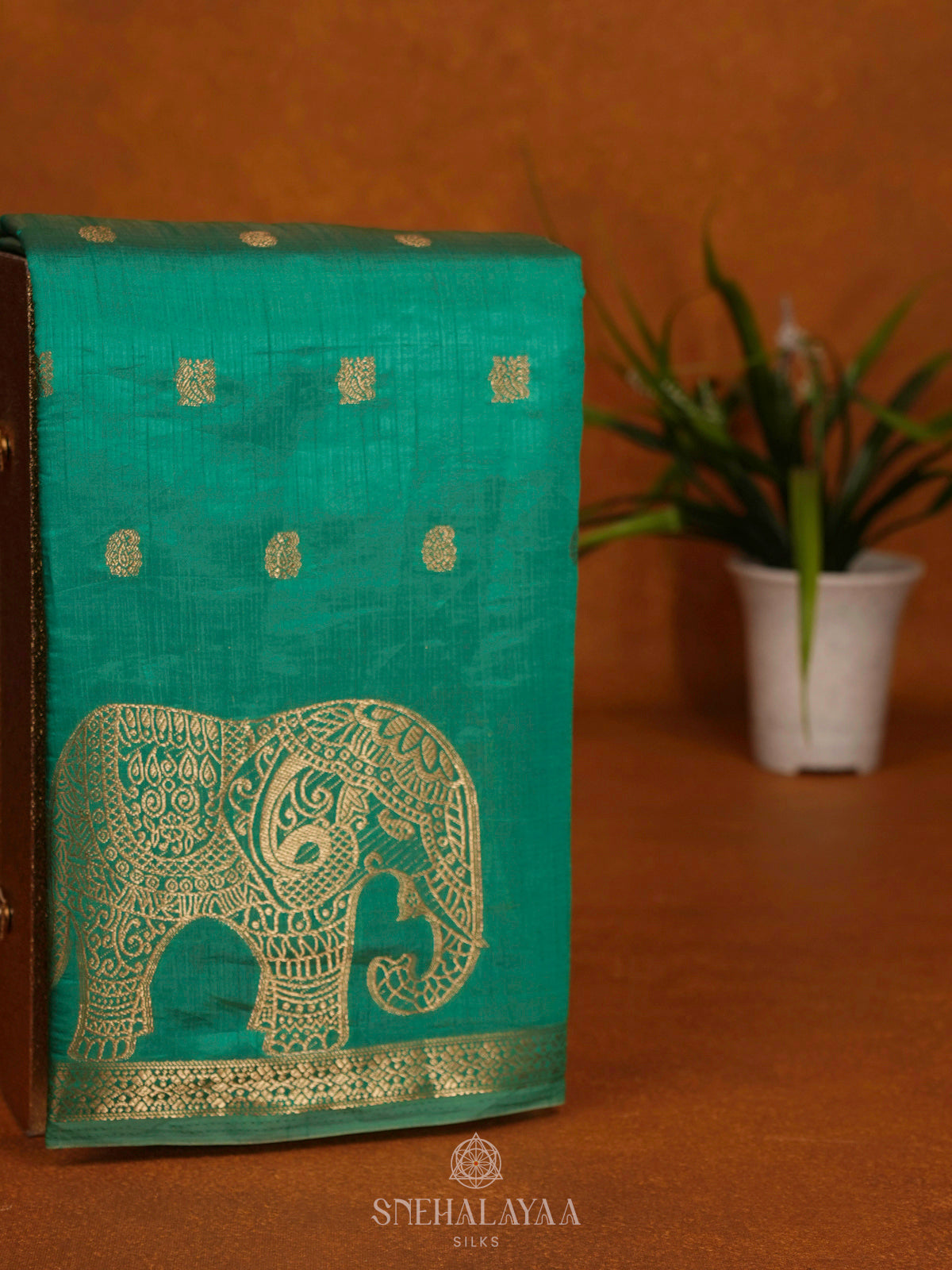 Teal Green Raw Silk Saree