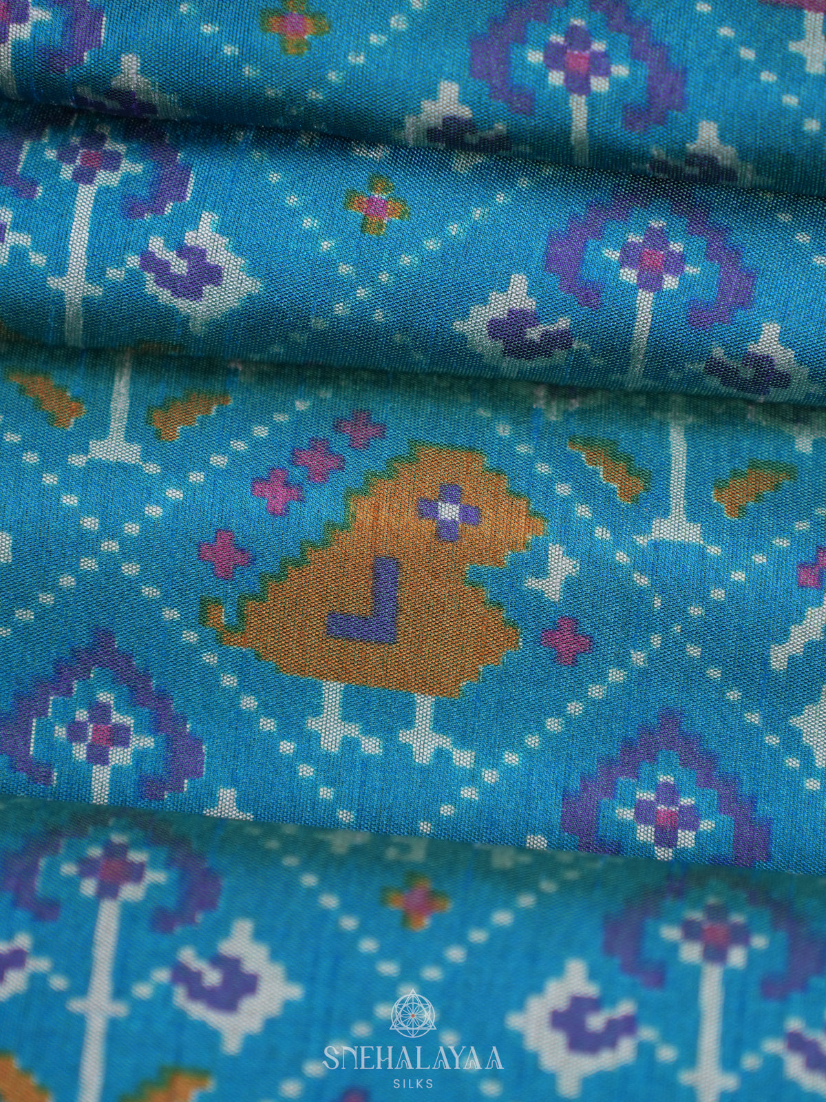 Teal Green Ikat Saree