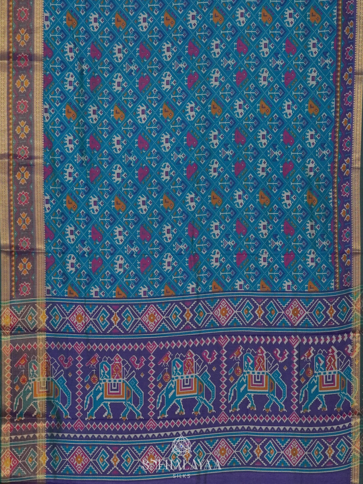 Teal Green Ikat Saree