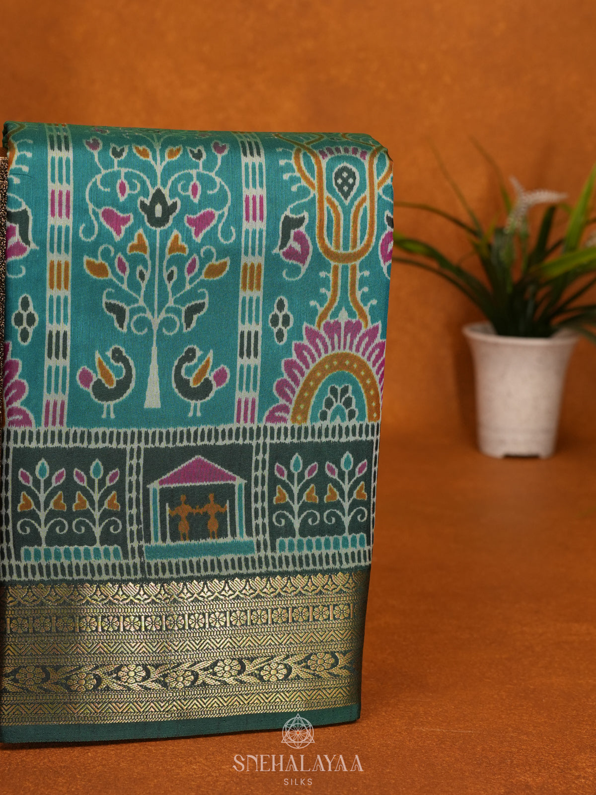Teal Green Ikat Saree