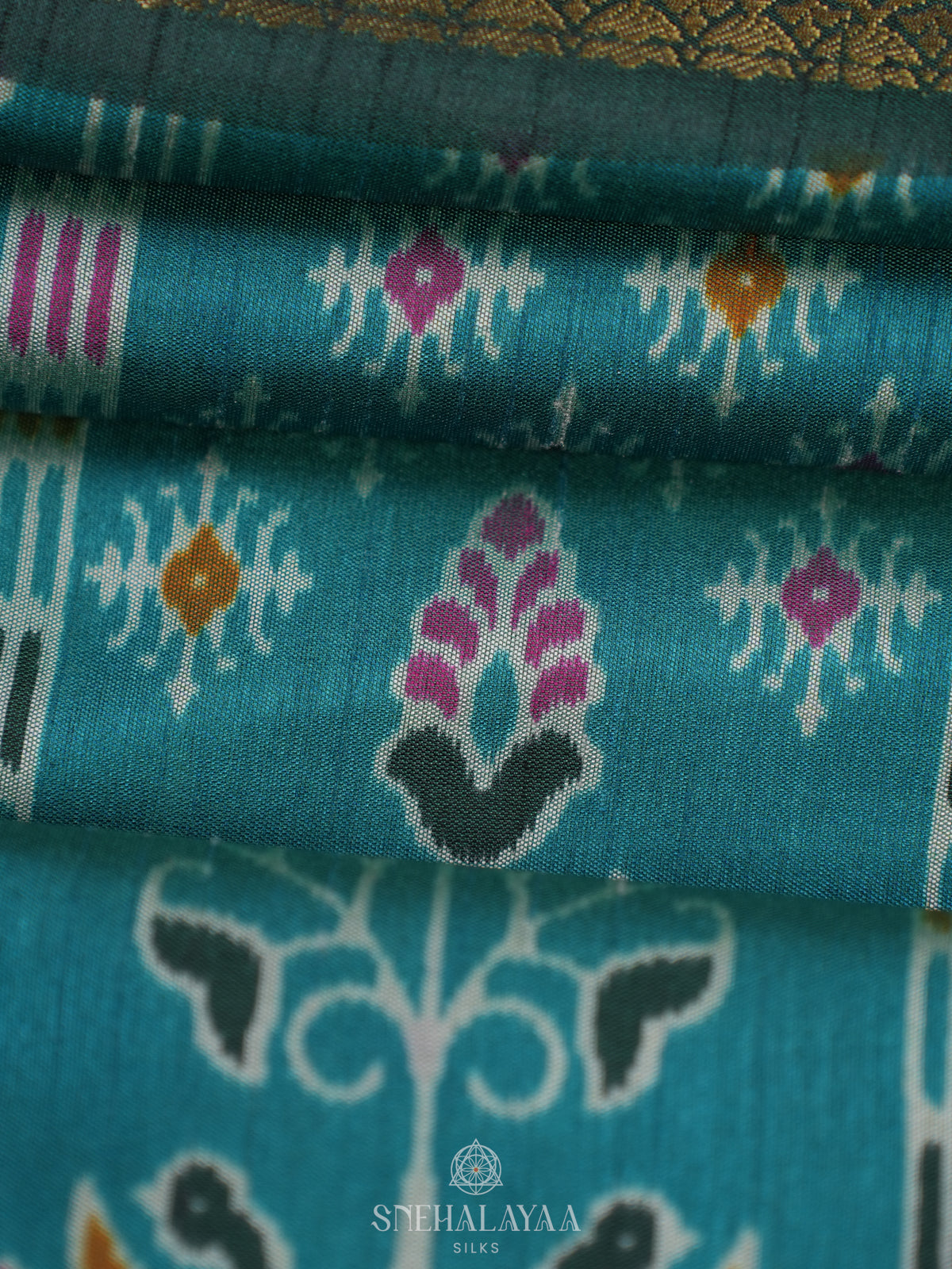 Teal Green Ikat Saree