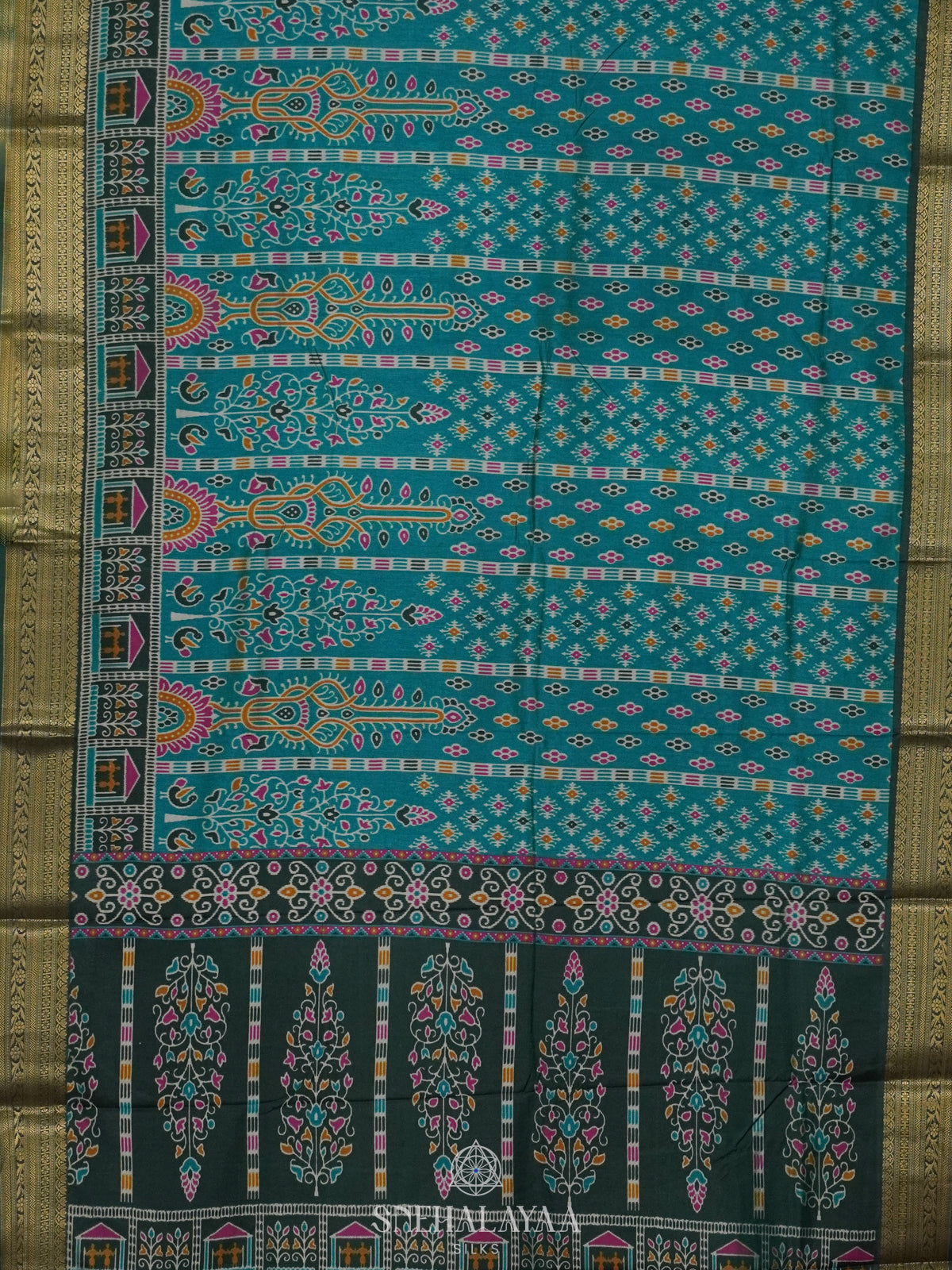 Teal Green Ikat Saree