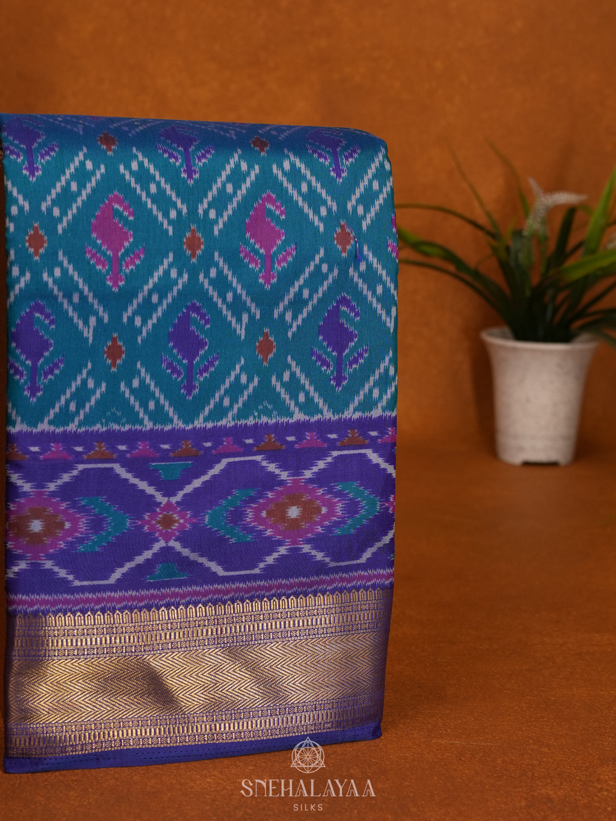 Teal Blue Ikat Saree