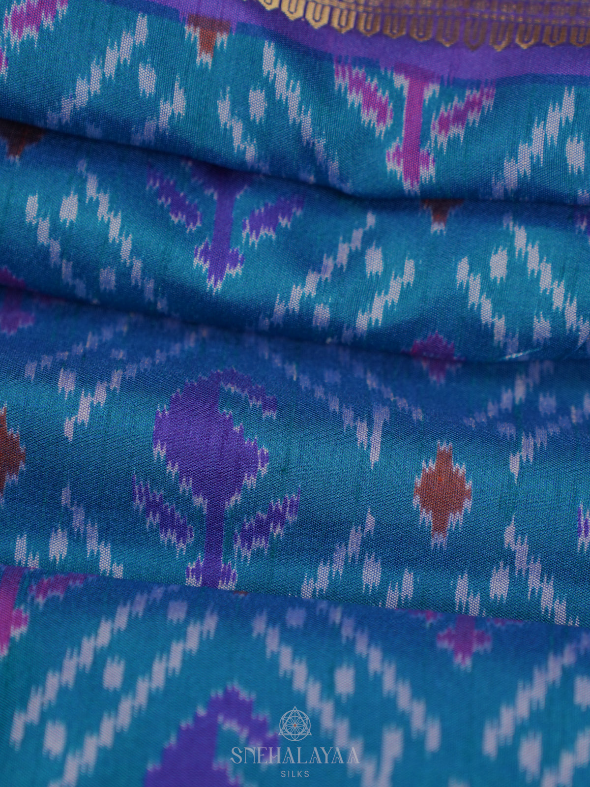 Teal Blue Ikat Saree