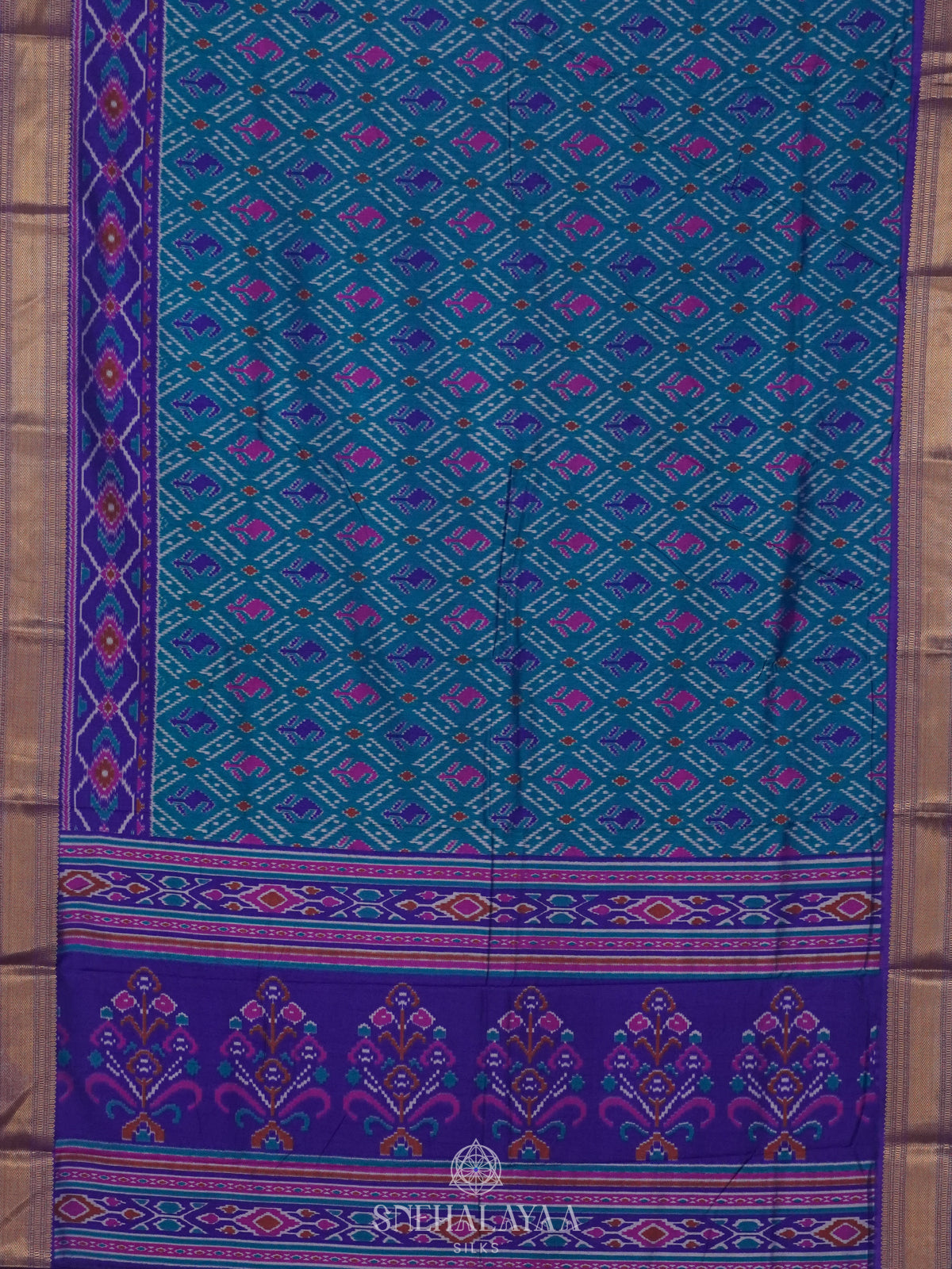 Teal Blue Ikat Saree