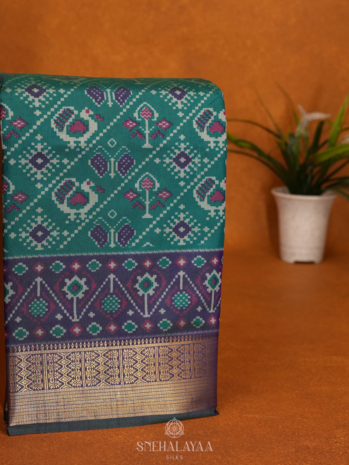 Teal Green Ikat Saree