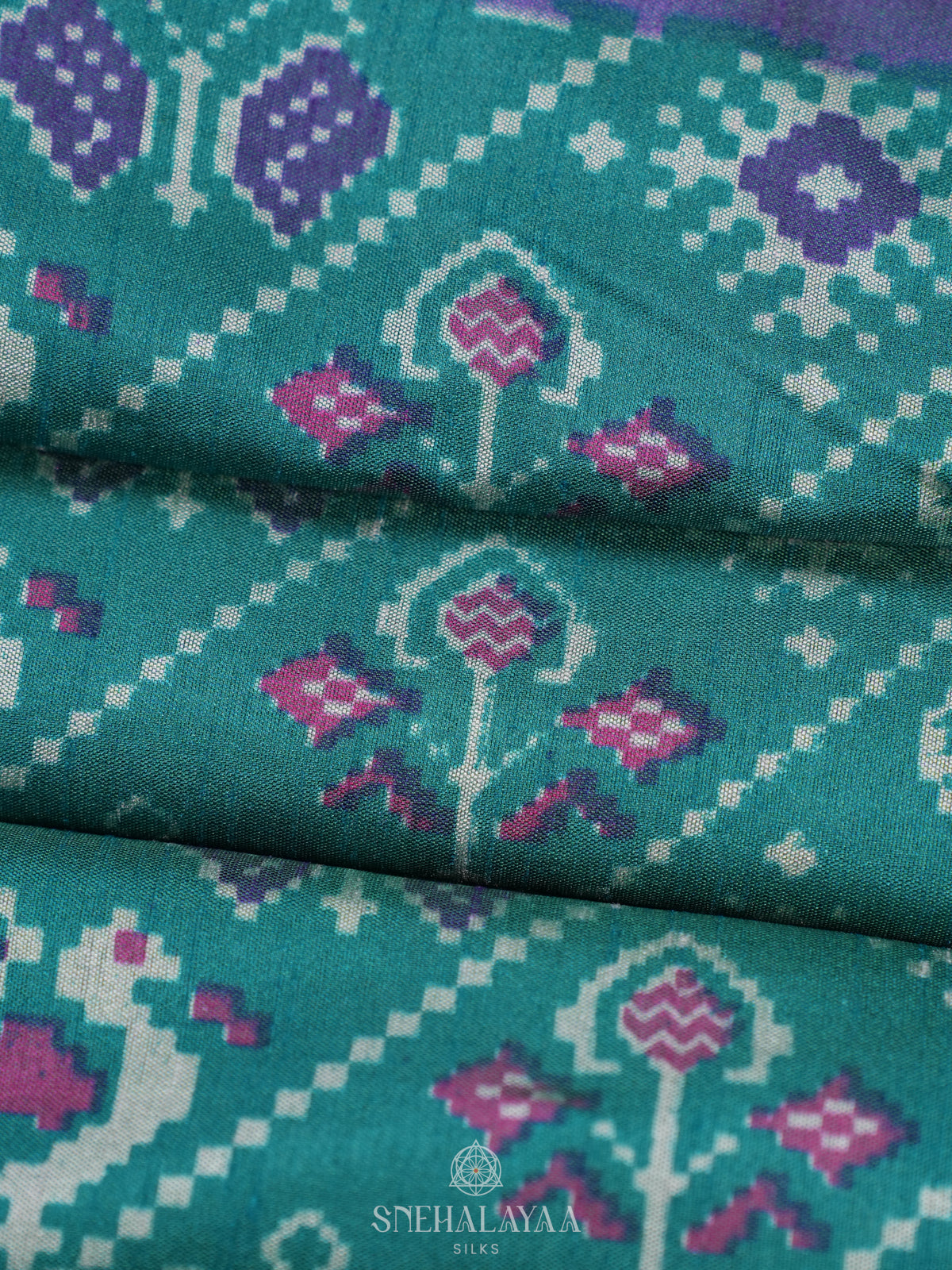 Teal Green Ikat Saree