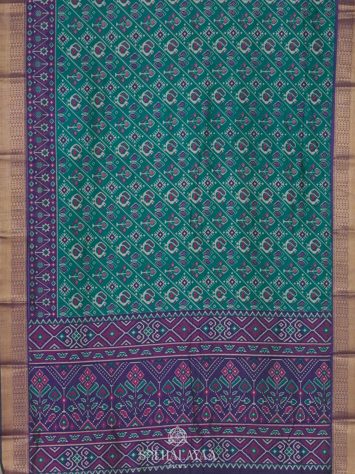 Teal Green Ikat Saree
