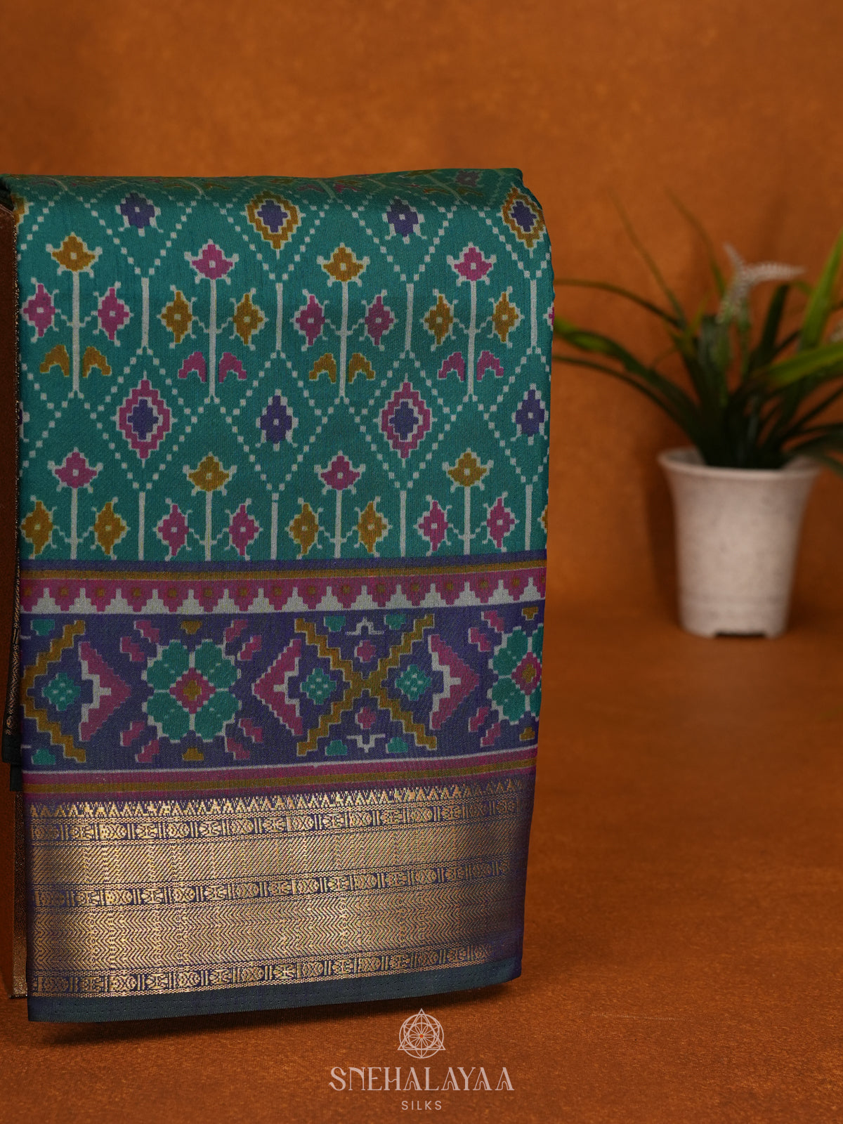Teal Green Ikat Saree