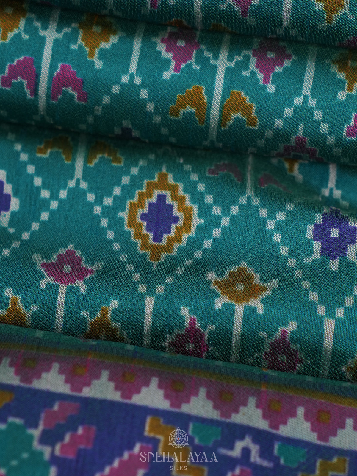 Teal Green Ikat Saree