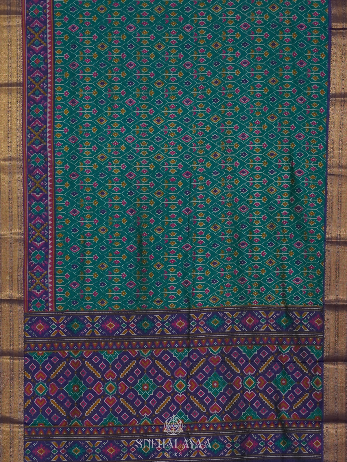 Teal Green Ikat Saree