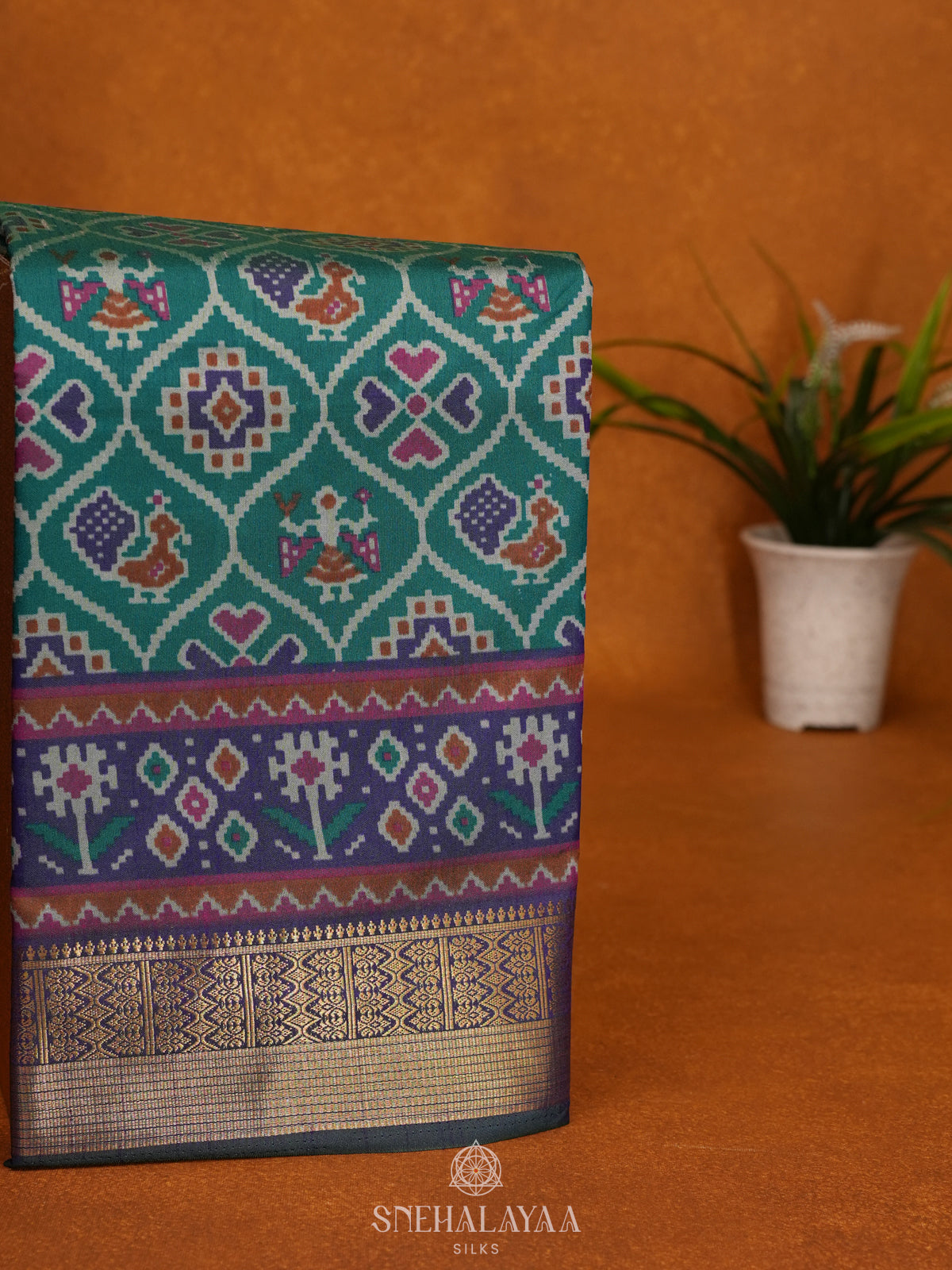 Teal Green Ikat Saree