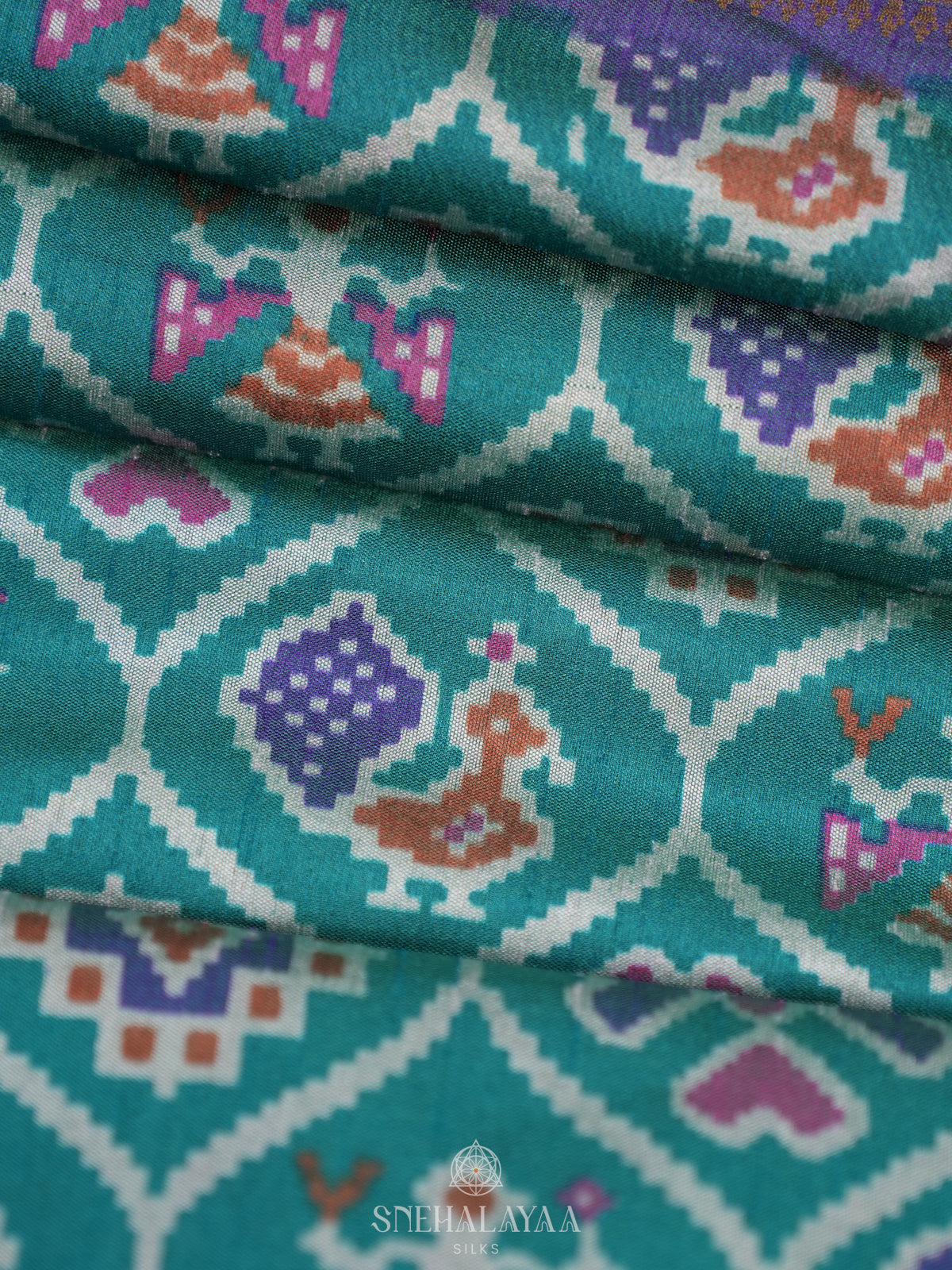 Teal Green Ikat Saree