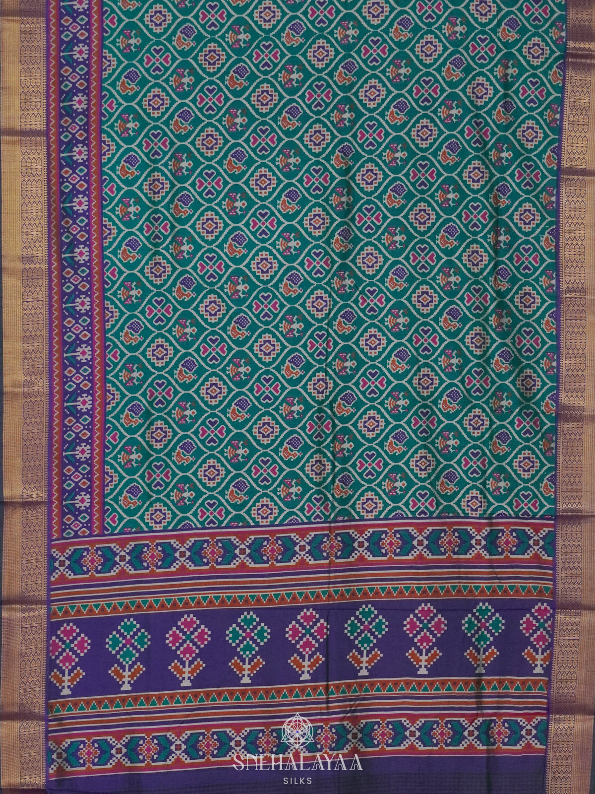 Teal Green Ikat Saree