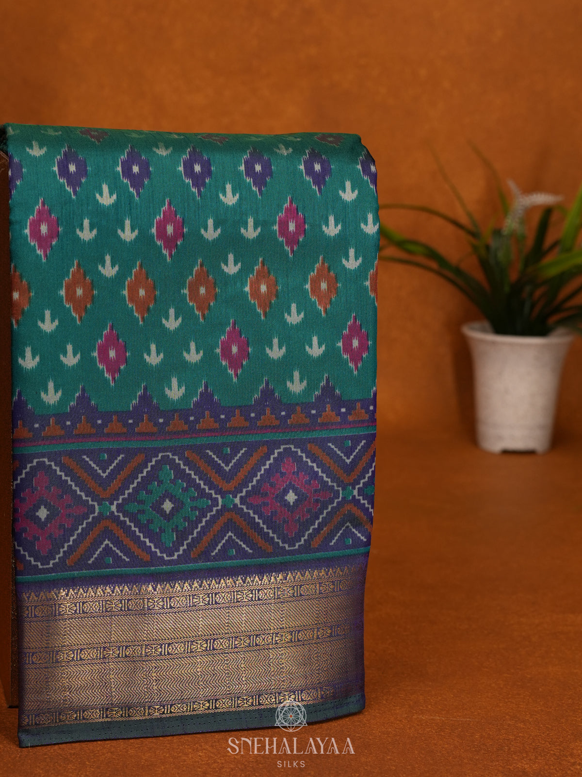 Teal Green Ikat Saree